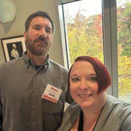 Officer Brian Wammack (left) and Legal Specialist Nicole Hagen (right) at the conference