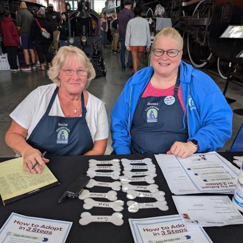 Volunteers Holly and Danni at the adoption outreach